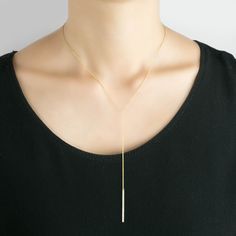 "14k solid gold bar drop necklace is made with a sturdy chain with the right amount of weight so the necklace can be worn layered with other necklaces of your own. It has 3\" drop chain and 1.25\" bar attached at the end. This necklace is 16~18\" adjustable by default and it is ready for immediate shipping. * Bar length: ≈1.25\" * Chain drop: ≈3\" * 14k diamond cut chain length: 16-18\" adjustable by default * Spring ring clasp * Made of 100% recycled precious metal * Comes in a gift box with a Necklace Bar, Gold Lariat Necklace, Minimal Necklace, Y Necklace, Rose Gold White, Necklace Simple, White Gold Necklaces, Ring Size Guide, Lariat Necklace