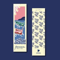 two bookmarks with an image of boats on the water and trees in the background