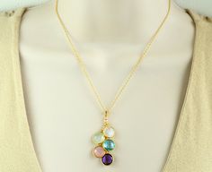 "This is a beautiful cascading gemstone necklace that will gorgeously represent family or friends. This makes a perfect and meaningful gift for a loved one or yourself. Birthstones are approximately 10mm. Information We Need From You: ► Birthstones (or Birth-months) in order from top to bottom ► Chain Style; cable or satellite. Default is cable chain. Please let me know the order details you'd like in the \"Message to Seller\" text box at checkout. Thank you! Looking to have this design with let Birthstone Necklace Mothers, Meaningful Christmas Gifts, Mom Necklace Personalized, Mommy Necklace, Bead Creations, Original Necklace, Christmas Gifts For Grandma, Mother Jewelry, Christmas Gift For Mom