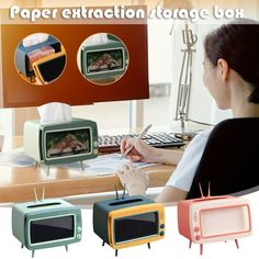 a woman sitting at a desk in front of a computer with an image of a toaster oven on it