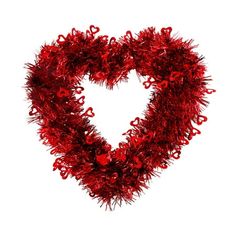 a heart shaped wreath with red tinsel on it's sides and hearts in the middle