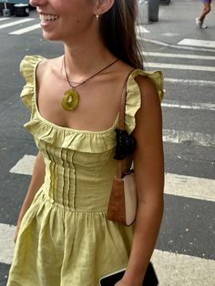 #StreetStyle #SummerFashion  #kiwi #RuffleDress #CasualChic #FashionInspo #CityStyle #TrendAlert #EffortlessFashion #StylishAccessories Yellow Summer Dress Aesthetic, Tweed Set Outfit, Butter Yellow Outfit, Yellow Fitted Cottagecore Dress, Matilda Djerf Yellow Dress, Yellow Ruffle Hem Summer Mini Dress, Urban Outfitters Yellow Summer Dress, Tailored Clothes, Looks Country