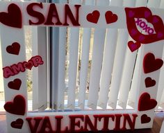 a valentine's day photo frame made out of wood with hearts and the word san