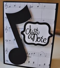 a close up of a card with music notes