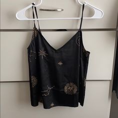 Super Cute Black Tank, Loose Fitting, Great For Date Night! Black Embroidered Tops For Night Out, Black V-neck Camisole For Party, Black Flirty Camisole Top, Embroidered Sleeveless Camisole, Black Fitted V-neck Camisole, Velvet Bustier, Black Lace V-neck Camisole, Honey Punch, Satin Camisole