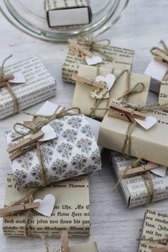 a bunch of wrapped presents sitting on top of a table