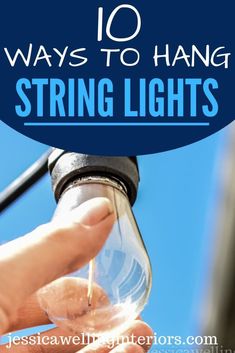 a hand holding a light bulb with the words 10 ways to hang string lights