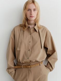 Composition : cotton 75% nylon 25%Color : BrownCountry of Origin : Republic of Korea Brown Cotton Shirt For Work, Brown Cotton Workwear Blouse, Brown Collared Shirt For Spring, Brown Cotton Blouse For Work, Brown Spread Collar Tops For Spring, Brown Relaxed Fit Shirt For Work, Spring Brown Spread Collar Top, Brown Collared Shirt For Workwear, Brown Collared Shirt For Work