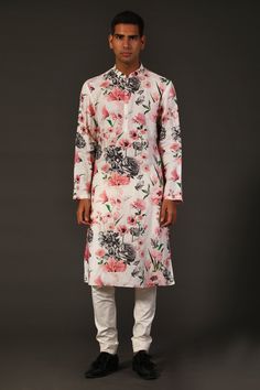 Ivory kurta with floral printed motifs and front buttons. Paired with cotton churidar.
Component: 2
Pattern: Printed
Type Of Work: Floral
Neckline: Mandarin
Sleeve Type: Full Sleeves
Fabric: Linen, Lining: Cotton
Color: White
Other Details: 
Floral print
Front buttons
Occasion: Wedding - Aza Fashions Cotton Churidar, Kurta Set For Men, Rohit Bal, White Kurta, Churidar, Kurta Set, Full Sleeves, Floral Printed, Aza Fashion