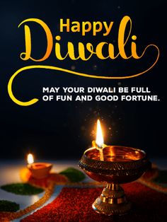 happy diwali greeting card with two lit candles