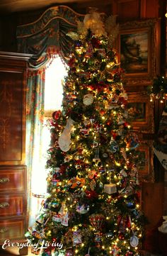 a decorated christmas tree in a living room