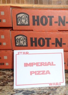 several pizza boxes stacked on top of each other with hot - n - roll instructions