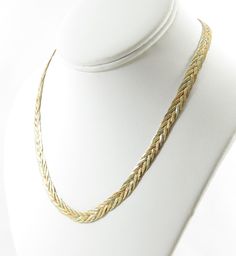 Italy/Italian 14k yellow, rose and white gold 18" long 20.8g condition: excellent Wonderful Italian braided chain, crafted of 14 karat yellow, rose and white gold.  The chain is 18" long, and has nice heft at 20.8g.  It measures 7mm wide and features a braided design interwoven with rose gold, white gold and yellow gold.  It fastens securely with a 14k gold box clasp, with an added safety clasp for additional security.  It is marked 14k and Italy and is guaranteed to be 14k gold.  This beautiful vintage chain would be perfect as a holiday gift, or it would look great layered with your other favorites! All of our fine jewelry ships next day, free and insured. 14k Gold Snake Chain Necklaces With Diamond Cut, 14k Gold Wheat Chain Jewelry For Anniversary, 14k Gold Herringbone Necklace, Flat Chain Necklace, Jewelry Layering Necklace, Jewelry Layering, Gold Box, Box Clasp, 14k Gold Necklace