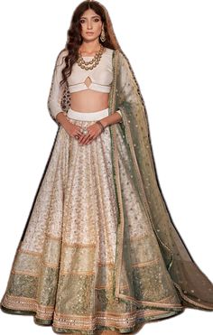 White Raw Silk Lehenga For Reception, White Embroidered Raw Silk Gown, White Raw Silk Gown With Dupatta, Designer Raw Silk White Gown, Designer White Raw Silk Gown, White Floor-length Lehenga For Transitional Season, Festive White Raw Silk Gown, White Lehenga With Intricate Embroidery In Tissue Silk, White Lehenga In Tissue Silk With Intricate Embroidery