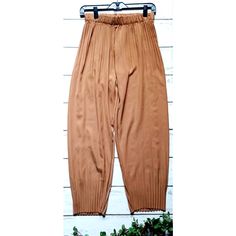 Zuiki Pleat Detail Paperbag Style Pants In Color Tabacco. 100% Polyester, Made In Italy. Brand New With Tags, Women's Size Large Measures 25" Inches Approx Waist; Hips Approx. 44; Inseam Approx. 27.5" Inches. Retail $75. Fire_attire Price $52 Brown Pleated Bottoms For Workwear, Beige Tapered Leg Harem Pants For Work, Pleated Khaki Bottoms For Fall, Khaki Pleated Bottoms For Fall, Brown Pleated Wide Leg Bottoms, Brown Pleated Wide-leg Bottoms, Fall Pleated Khaki Bottoms, Beige High-waisted Pleated Pants, High Waist Brown Harem Pants For Fall