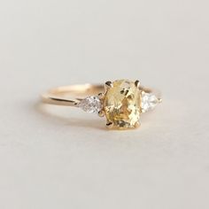 Oval Engagement Ring Yellow Sapphire Engagement Ring Three - Etsy Yellow Stone Engagement Ring, Yellow Sapphire Engagement Ring, Yellow Sapphire Ring Engagement, Yellow Diamond Engagement Ring, Yellow Sapphire Rings, Oval Engagement Ring, Cute Engagement Rings, Yellow Diamond Rings, Yellow Engagement Rings