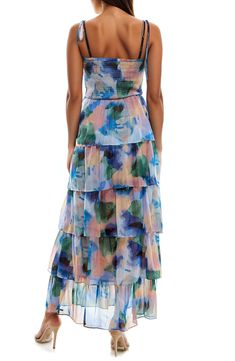 A smocked bodice adds just the right amount of structure to an airy maxi dress in an artistic floral pattern. 50" center front length (size M) Slips on over head Square neck Adjustable tie straps Lined skirt 100% polyester Machine wash, line dry Imported Spring Maxi Dress With Ruched Bodice And Flowy Skirt, Chic Multicolor Maxi Dress With Smocked Back, Multicolor Spring Dresses With Ruched Bodice, Spring Multicolor Dress With Ruched Bodice, Spring Dress With Ruched Bodice And Flowy Skirt, Spring Flowy Ruched Maxi Dress, Multicolor Midi Maxi Dress With Smocked Bodice, Flowy Ruched Maxi Dress For Spring, Strapless Flowy Maxi Dress With Smocked Back