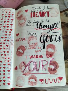 an open notebook with handwritten words and hearts on the pages that say i love you