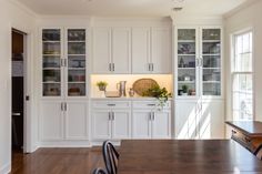 the kitchen is clean and ready for us to use as a dining room or office