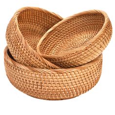 three wicker baskets sitting on top of each other