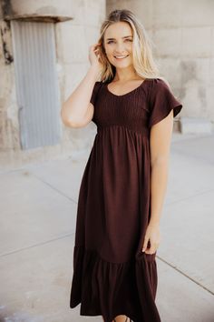 $59.00 The Kendall | Mulberry Mocha Smocked Midi Dress https://www.batessistersboutique.com/product/the-kendall-mulberry-mocha-smocked-midi-dress/ Approx. Measurements in Inches
XS
S
M
L
XL
XXL


Length
36
36.5
37
37.5
38
39


Bust
26
28
30
34
36
36


Waist
22
26
28
32
34
34



  Bates Sisters Boutique Tank Sweater Dress, Brown Dress Modest, Modest Everyday Dresses, Brown Flowy Maxi Dress With Smocked Bodice, Fitted Brown Maxi Dress With Smocked Back, Casual Brown Maxi Dress With Smocked Bodice, Brown Midi Length Dress With Smocked Back, Fitted Brown Smocked Dress With Smocked Back, Brown Fitted Smocked Dress With Smocked Back