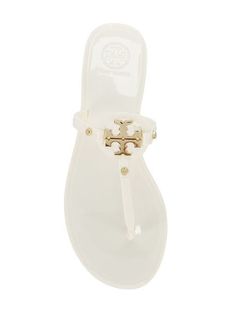 Adjustable Flat Jelly Sandals For Beach Season, Trendy White Jelly Sandals With Flat Heel, Trendy White Flat Heel Jelly Sandals, White Open Toe Jelly Sandals, Trendy Jelly Sandals With Translucent Outsole For Beach, Trendy Jelly Sandals For Beach With Translucent Outsole, Flat Jelly Sandals For Summer, White Flat Heel Jelly Sandals For Vacation, Jelly Sandals For Beach In Summer