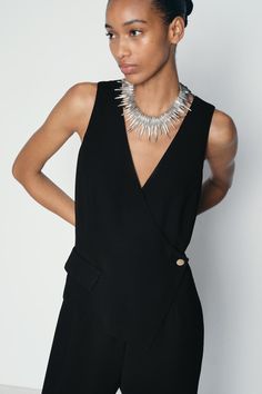 ASYMMETRIC VEST JUMPSUIT - Black | ZARA United States Sleek Sleeveless Jumpsuits And Rompers For Work, Sleek Sleeveless Jumpsuit For Work, Elegant Asymmetrical Jumpsuits And Rompers For Work, Sleeveless Evening Jumpsuits And Rompers By Zara, Zara Sleeveless Jumpsuits And Rompers For Party, Zara Sleeveless Evening Jumpsuits And Rompers, Zara Sleeveless Jumpsuits For Evening, Sleeveless Formal Jumpsuits And Rompers By Zara, Waistcoat Jumpsuit