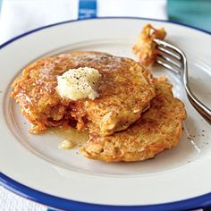 pancakes with butter and syrup on a plate