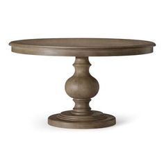 a round wooden table with two pedestals on each side and one end at the top