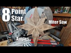 a wooden star sitting on top of a table next to other woodworking supplies and tools