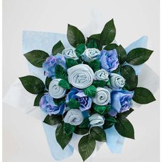 blue and white flowers are arranged in the shape of an origami flower bouquet