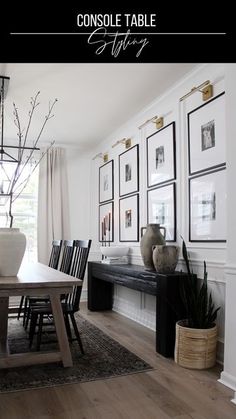 a dining room table with chairs and pictures on the wall in front of it that says console table styling