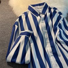 Blue white striped shirt women's spring autumn loose retro classical blouse niche designer long-sleeved shirts men elegant wear aidase-shop Long Sleeve Blouse With Vertical Stripes For Summer, Summer Long Sleeve Blouse With Vertical Stripes, Striped Long Sleeve Shirt For Spring, Striped Long Sleeve Shirt For Fall, Spring Long Sleeve Blouse With Vertical Stripes, Blue Long Sleeve Tops With Vertical Stripes, Blue Long Sleeve Blouse With Vertical Stripes, Vertical Stripes Long Sleeve Shirt For Fall, Long Sleeve Shirt With Vertical Stripes For Fall