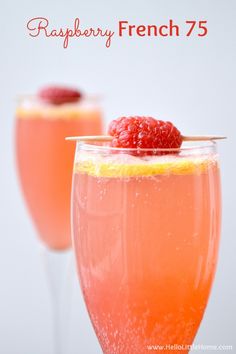 two glasses filled with raspberry french 75