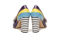 Unique purple Mary Jane high heel leather pump truly presents phrase: Shoe love is true love! Made in purple color of softest leather they are celebration of shoes in most colorful and playful way. Set on stiped high block heel makes them extremely comfortable and stabile. Underneath the button is hidden elastic so they fit every width. Embellished with black and white stripes on piping and big button they are special as every woman wearing them. Extravagant but extremely comfortable these high Purple Heels With Sculpted Heel And Round Toe, Multicolor 4-inch Leather Heels, Trendy Purple Leather Heels, Shoes Block Heels, Black Court Shoes, Purple High Heels, Leather Drawstring Bags, White High Heels, Office Shoes