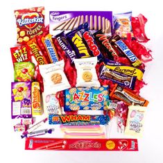 an assortment of candy and candies on a white background