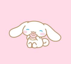 a cartoon bunny with a pacifier in it's mouth on a pink background