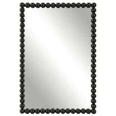 a black beaded mirror on a white background