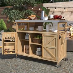 an outdoor kitchen with lots of food on the counter and shelves in front of it