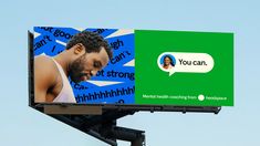 a billboard with a man's face and speech bubbles on it that says you can