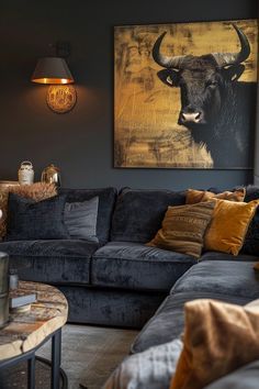 a living room filled with furniture and a painting on the wall