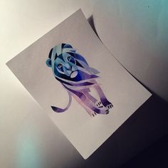 an image of a blue and purple elephant on a piece of paper