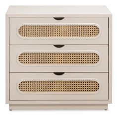 two white drawers with rattan handles on each side and one drawer closed to the other