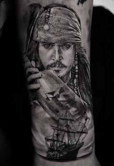 a man with a pirate tattoo on his arm