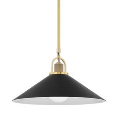 a black and gold pendant light hanging from the ceiling