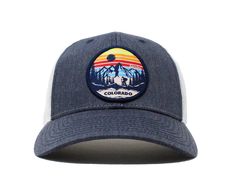 Coloradans are always up for an adventure! This design was inspired by those who love to explore in the mountains. Whether you’re hiking in the high country, fishing Colorado’s beautiful rivers, skiing or exploring the state’s historic mountain towns, our Trek Colorado design is a symbol of adventure and exploration. As part of Adventum’s Colorado Collection, the exclusive Trek Colorado Trucker Hat, highlighting the iconic silhouette of the Rocky Mountains, is crafted with care and attention to Adjustable Trucker Hat For Winter Outdoor Activities, Winter Trucker Hat With Curved Brim For Outdoor Activities, Winter Trucker Hat For Outdoor Activities, Country Fishing, Colorado Hat, Colorado Design, Colorado Landscape, Mountain Silhouette, Mountain Town