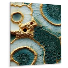 an abstract art piece with gold and blue details on it's surface, including circles