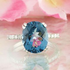 Welcome to our Etsy store 💕 Discover the enchanting beauty of our Natural Topaz Diamond Ring, meticulously crafted in luxurious 14k Sold Gold. London Blue Topaz is a birthstone for December. Historically, topaz has been linked to love and affection. London Blue Topaz, in particular, is thought to strengthen relationships and foster deep emotional bonds. 5.75 Carat Natural Topaz Diamond Ring In 14k Solid Gold Available in Slid 14k White, Yellow, Rose Gold  Stamped: 14K Total Ring Weight: 2.9 Gra Luxury Oval Blue Topaz Jewelry, Luxury Oval Topaz Ring With Gemstone Accents, Dazzling Oval Topaz Ring, Oval Sapphire Topaz Ring With Diamond Accents, Oval Topaz Ring With Diamond And Gemstone Accents, Oval Topaz Ring With Gemstone Accents, Oval Topaz Ring With Accent Stones, Oval Topaz Ring With Aquamarine And Gemstone Accents, November Birthstone Jewelry