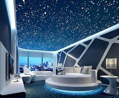 the ceiling is decorated with stars and white furniture