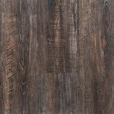 an image of wood flooring that looks like it has been painted brown and is very dark